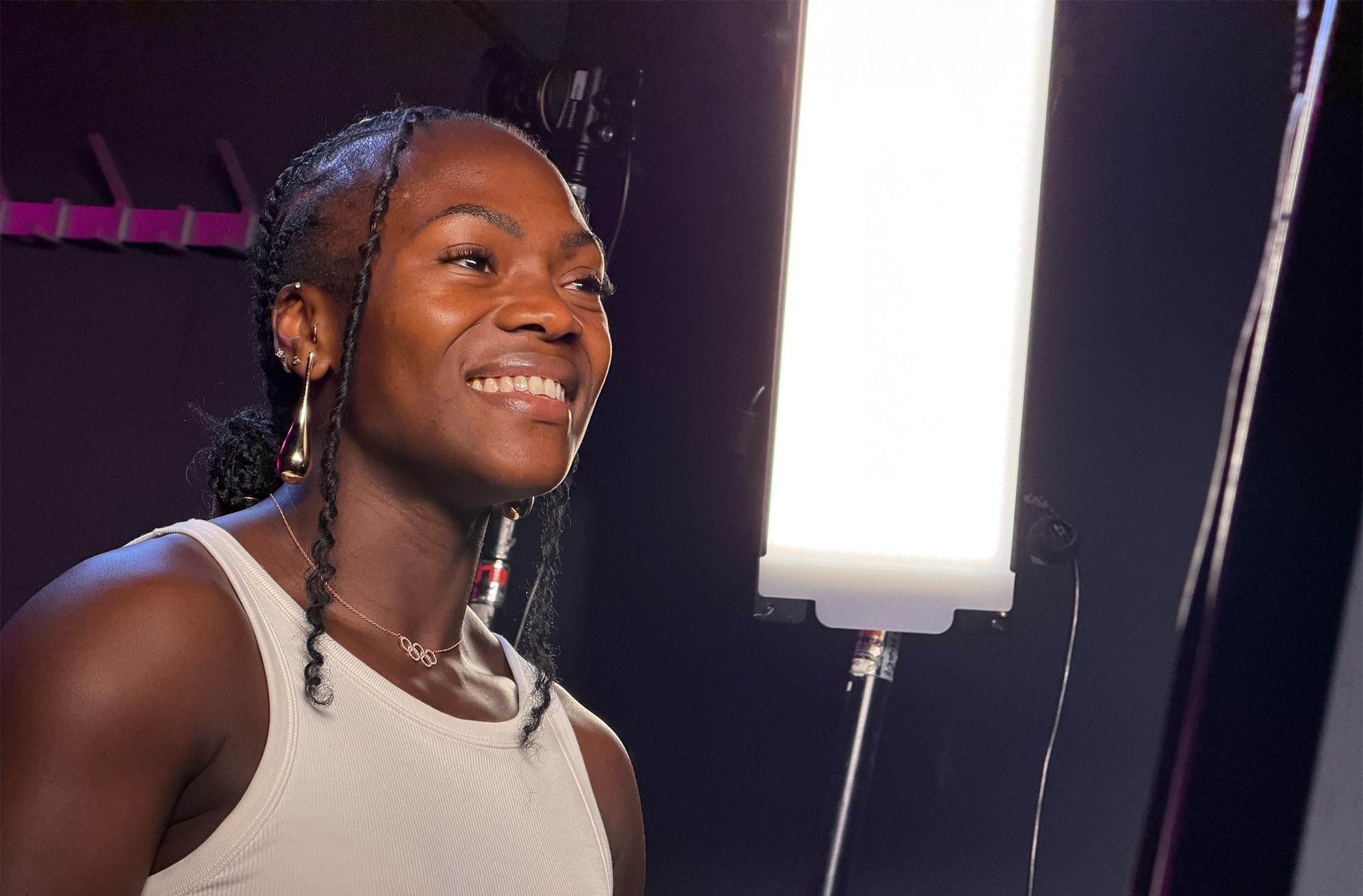 Clarisse Agbégnénou smiles during an interview, in a white top
