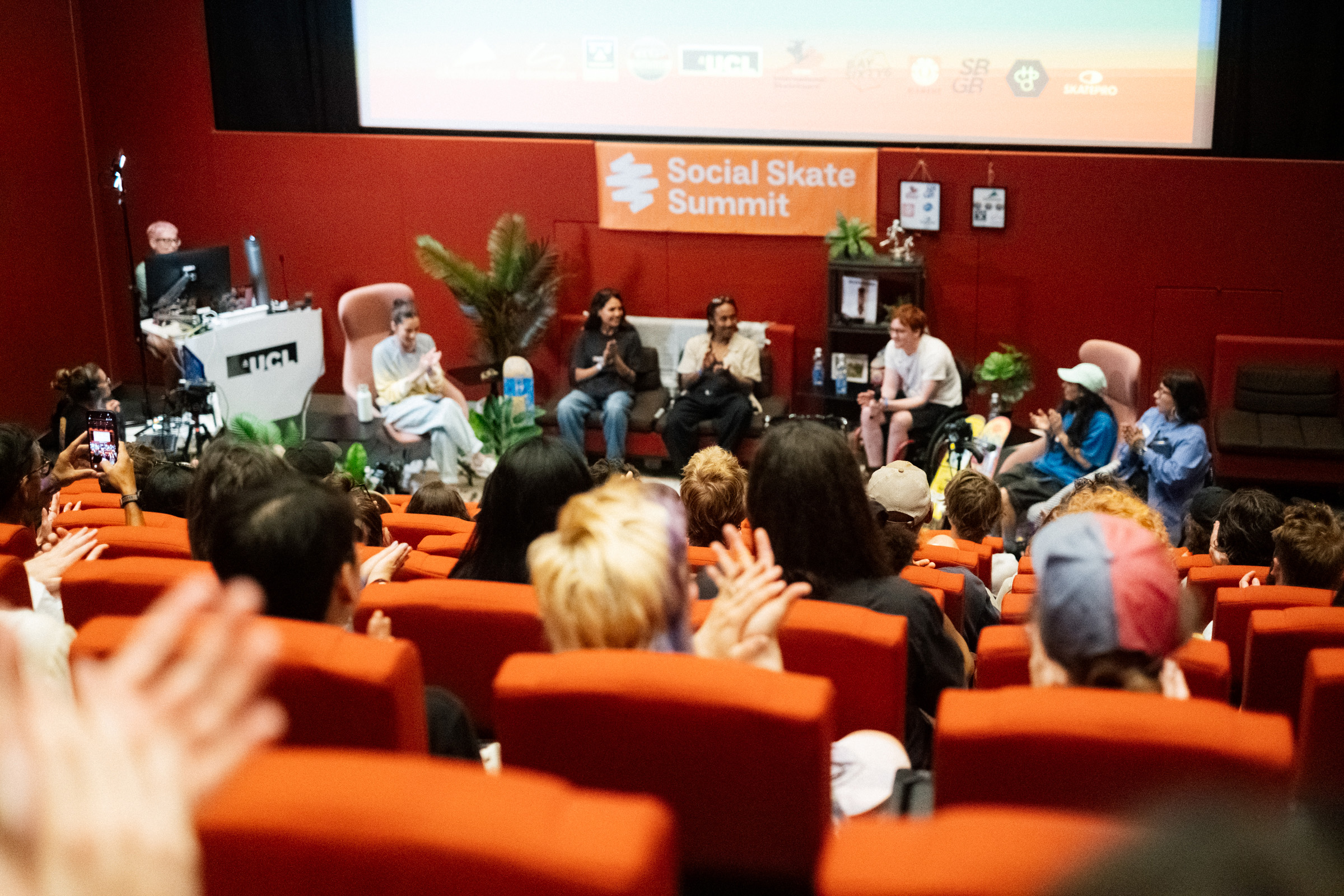 Houda, second speaker from the left, at the Social Skate Summit
