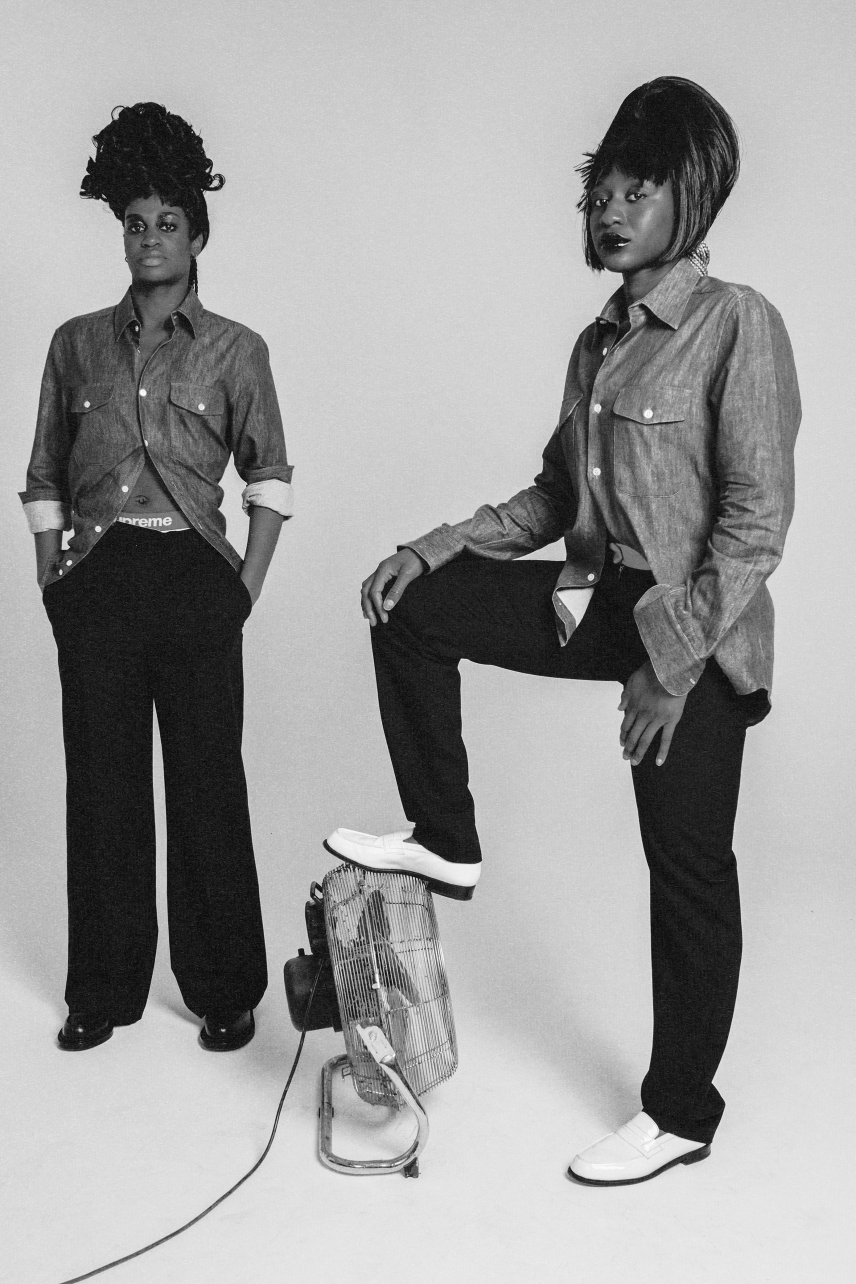 Duo of Marie-Antoinette Katoto and Kadidiatou Diani in shirts, black-and-white studio photograph