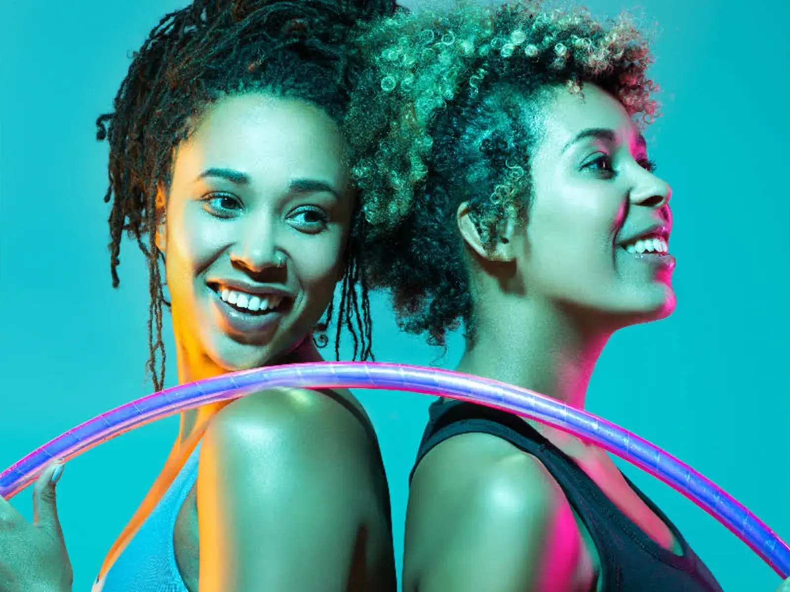 Photograph from the session published in Tinuke's Flaneurz interview, with two artists and hoops